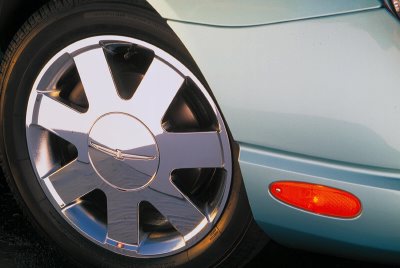 2002 Ford Thunderbird - Front wheel and fender detail of a 2002 Ford Thunderbird.
