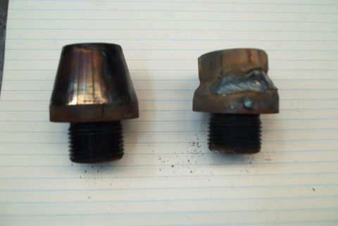 1983 Ford Bronco - Two threaded metal parts are shown, one with a conical top and the other with a welded hexagonal top.