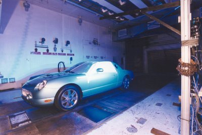 2002 Ford Thunderbird - A 2002 Ford Thunderbird is positioned in a wind tunnel, likely for aerodynamic testing.