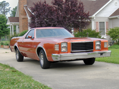 1979 Ford Ranchero - This pickup truck is parked in front of a house on a paved driveway.