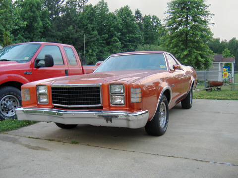 1979 Ford Ranchero - This 1979 Ford Ranchero is seen in a driveway next to a red pickup truck.
