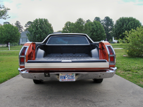 1979 Ford Ranchero - The rear of a 1979 Ford Ranchero pickup truck is shown with its tailgate down.