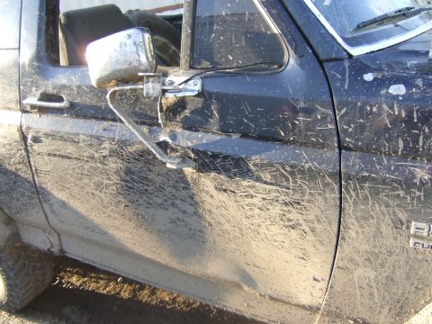 1989 Ford Bronco - Custom door for wussing out around that hole Adam was stuck in. Also discovered the transfer case went on this trip too. No wonder I was ge…