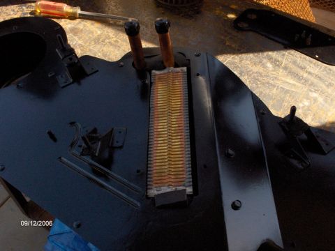 1966 Ford Fairlane - A close up of the new heater core. Notice the heater blower motor isn't installed in it's hole yet for this picture. That's a blue tarp ben…