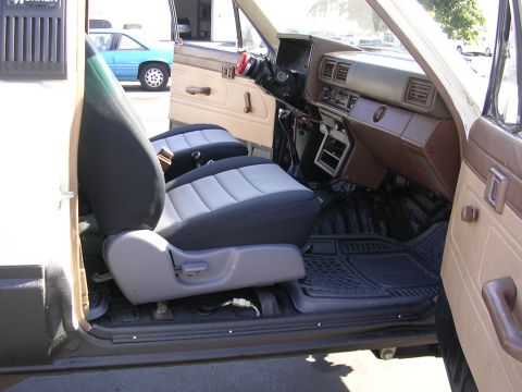 1985 Toyota 4Runner - The interior of a 1985 Toyota 4Runner shows off its seat covers and dashboard details.