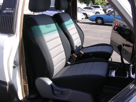 1985 Toyota 4Runner - Interior view of a 1985 Toyota 4Runner, custom 'Wet Okole' seat covers on the front seats.