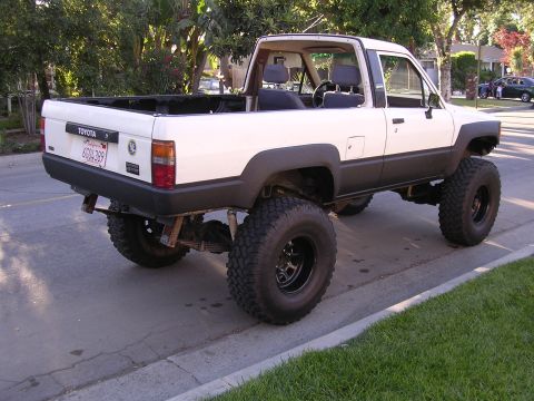 1985 Toyota 4Runner - This Toyota pickup truck has been modified with a significant lift and oversized tires.