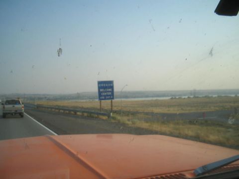 1979 Ford Bronco - Approaching the Oregon Welcome Center on a clear day, with a truck in the distance.