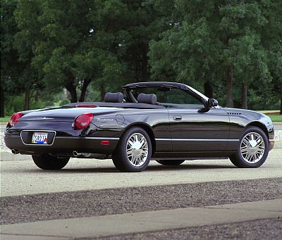 2002 Ford Thunderbird - This black 2002 Ford Thunderbird convertible is shown from the rear three-quarter angle.