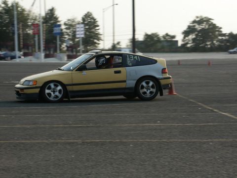 2001 Mercury Grand Marquis - A two-tone Honda CRX navigates a course marked by orange cones.