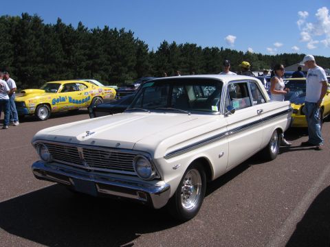 1989 Ford Mustang - White 1963 Ford Falcon sedan with chrome trim and racing wheels.