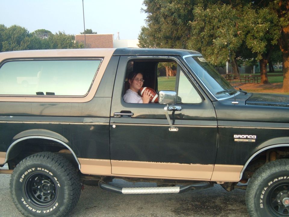 My girlfriend sitting in my truck