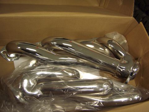 1996 Ford Bronco - New chrome exhaust headers are shown inside their shipping box.