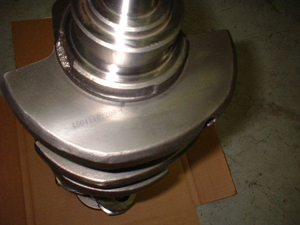 Crankshaft with part number 16041402200-C stamped on it