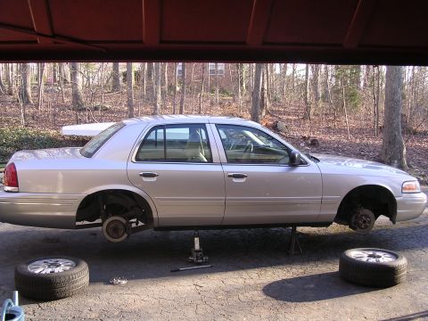 2003 Ford Crown Victoria - Tire rotation time.