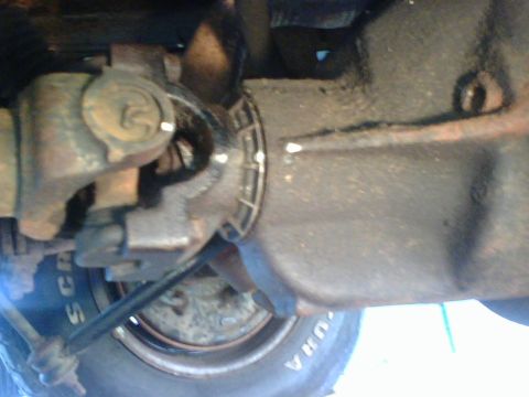 1989 Ford Bronco - Mark the relative position of the driveshaft to the axel for later reinstall