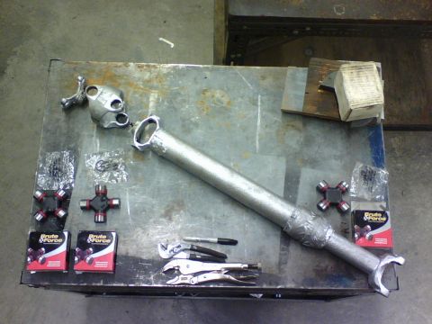 1989 Ford Bronco - here is the driveshaft all disassembled with the new parts ready to be put in. The part numbers for the dual u-joint end of the drive shaft…