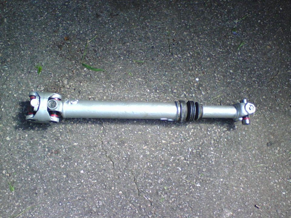 here is the driveshaft with new paint and u-joints (x3)