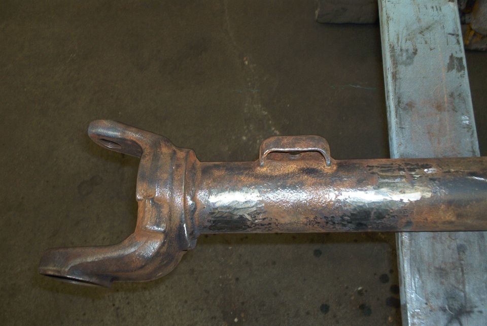 Rusted driveshaft yoke with a U-joint flange