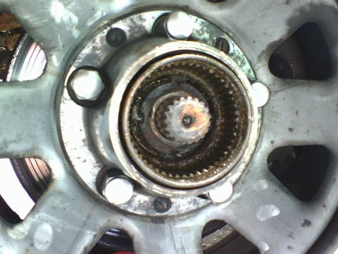 1989 Ford Bronco - Using the bearing nut socket I removed the bearing lock nut.