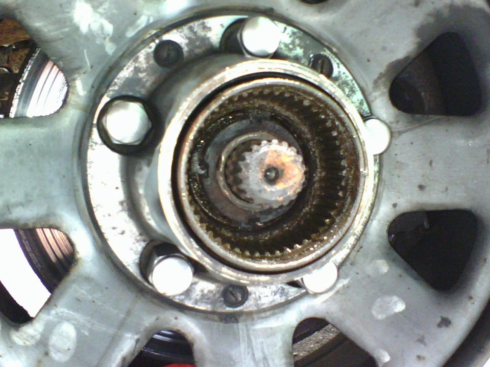Using the bearing nut socket I removed the bearing lock nut.