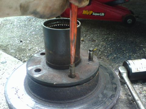 1989 Ford Bronco - I had removed the disc brake caliper pins and removed the caliper from the rotor. removed the rotor/hub assembly. I punched out the lug stu…
