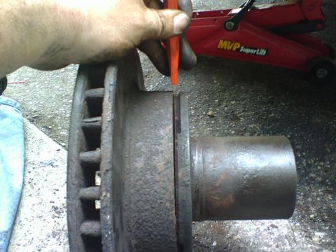 1989 Ford Bronco - using the beveled edge inbetween the hub and rotor I separated the two.