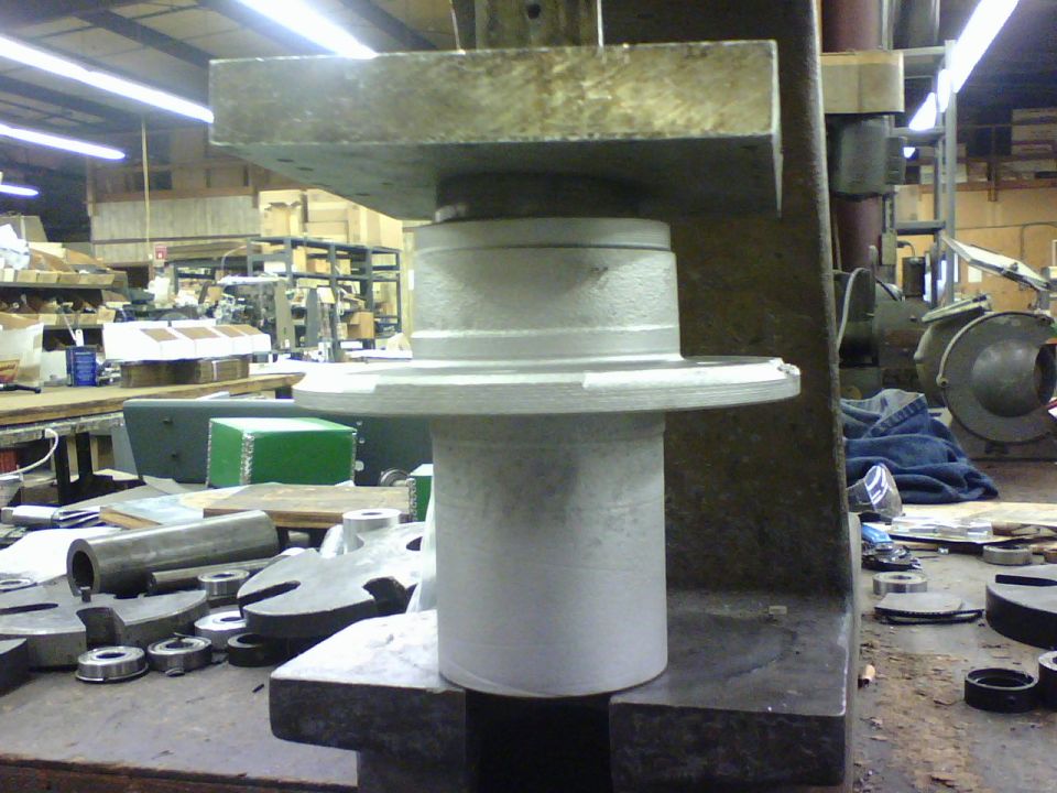 here is the hub after rehab and it is having the wheel bearing outer races pressed in.