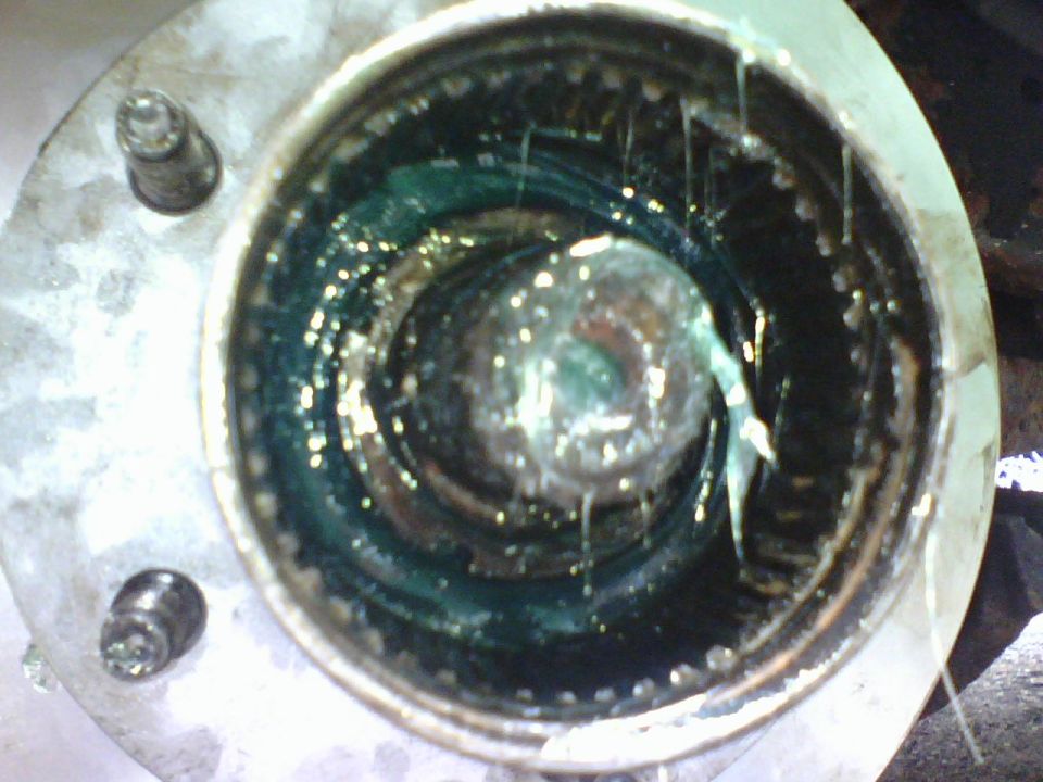 with the rear bearing seal pressed in I had slippped the bearings on the spindle and hand pressed the outer bearing with a tube matching the ID of the inner race.   the void inbetween the two bearings was filled with marine bearing grease as was suggested in the forum.