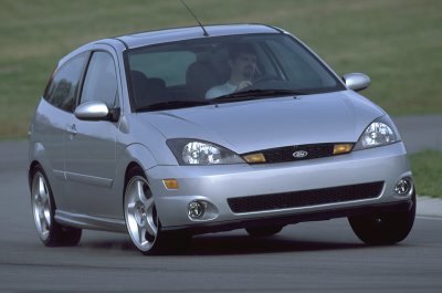 2002 Ford Focus - A silver 2002 Ford Focus SVT is captured in a three-quarter front view, its sporty design.