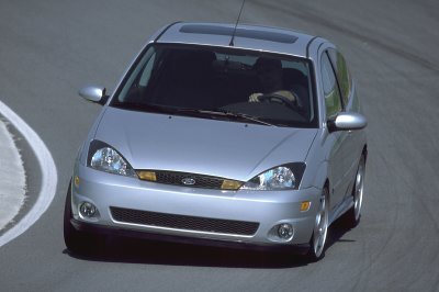 2002 Ford Focus - A silver Ford Focus hatchback is shown from a front three-quarter view on a paved surface.