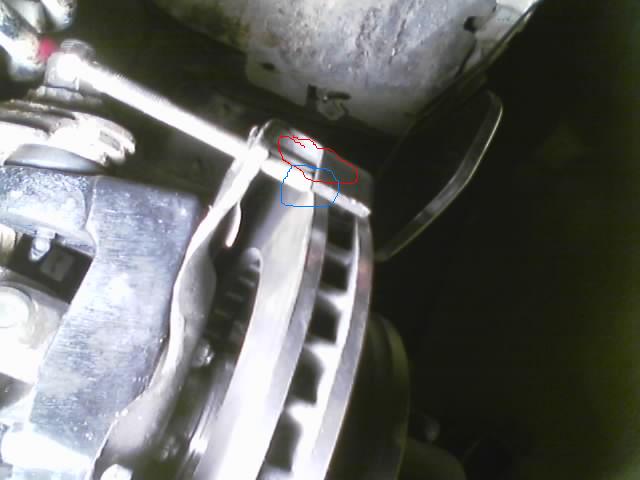 Vehicle brake caliper and rotor assembly, close-up view