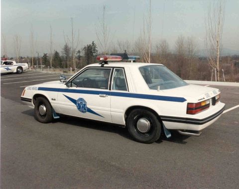 1987 Ford Mustang - 1983 SSP. First year WSP bought Mustangs. A total 30 were bought that year. Note the 1981 WSP Pontiac Trans-Am in the background.