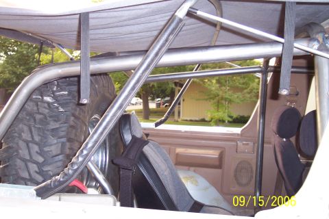 1989 Ford Bronco - Vehicle interior with roll cage and spare tire visible; date stamp indicates 2007.