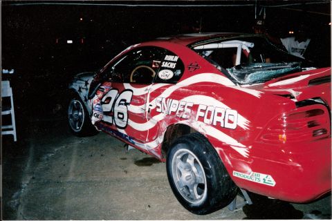 1995 Ford Mustang - Damaged 1995 Ford Mustang race car with "SNIPES FORD" livery and number 26.