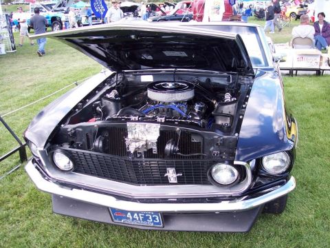 1972 Ford Ranchero - A 1969 Ford Mustang is displayed with its hood open, revealing the engine bay and a Colorado license plate.