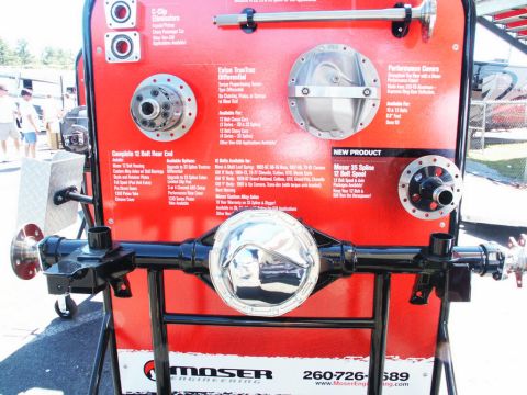 2001 Mercury Grand Marquis - Display board shows various Moser Engineering rear axle and differential components, including a complete 12-bolt rear end and new product…