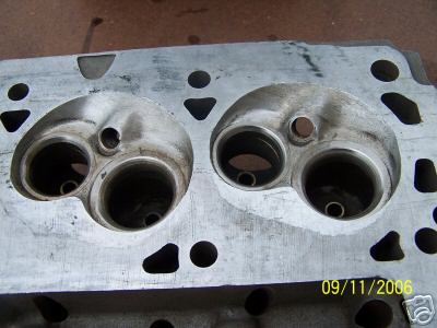 1972 Ford Ranchero - Close-up of an engine cylinder head, showing the combustion chambers and valve ports.