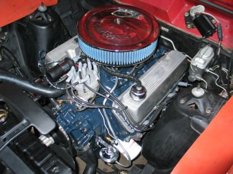 1972 Ford Ranchero - Close-up view of a vehicle's engine bay, showing the engine, air filter, and brake fluid reservoir.