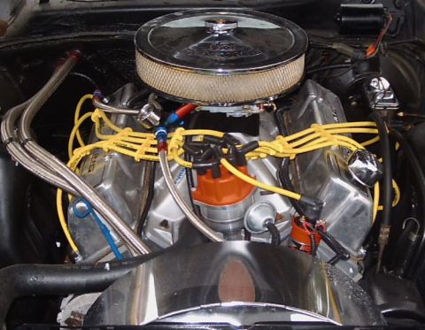 1972 Ford Ranchero - Close-up view of a V8 engine, likely a Ford Cleveland, with custom chrome and yellow accents.
