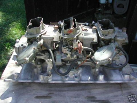 1972 Ford Ranchero - A multi-carburetor intake manifold is shown, detached from any vehicle.