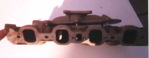1972 Ford Ranchero - Close-up of a cast iron intake manifold, likely for a V8 engine.