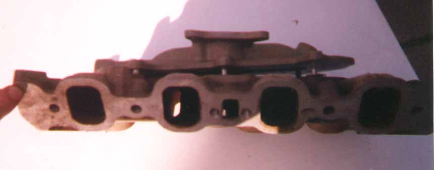 Cast iron intake manifold with multiple ports