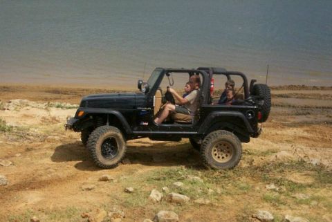 1993 Ford Bronco - Jeep near shoreline