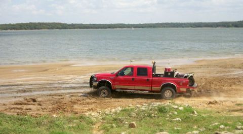 1993 Ford Bronco - Big Red Ford starting mud drag at shoreline