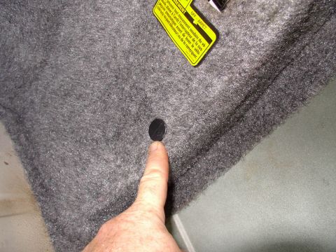 1990 Lincoln Town Car - Pop these plastic plugs out from the sides (four) and the rear just under the weatherseal (four mo') .