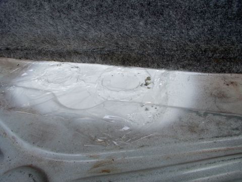 1990 Lincoln Town Car - A little saran wrap allows you to slap the newly cleaned carpets back in before the sealant is completely dried. I did the access holes und…