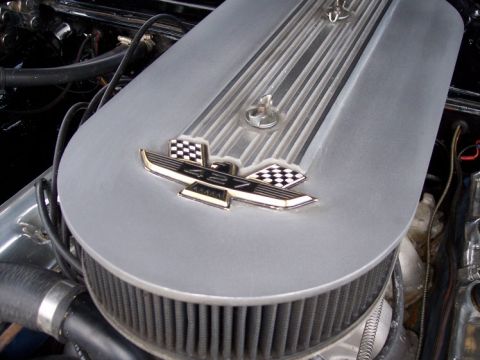 1972 Ford Ranchero - Close-up of a "427" engine air cleaner assembly with checkered flag emblems.