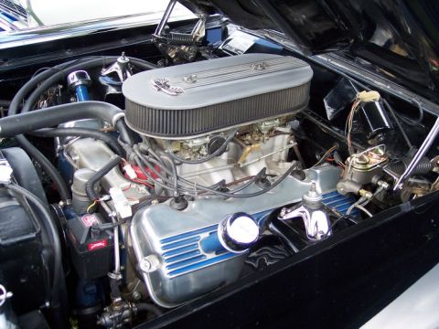 1972 Ford Ranchero - Close-up of a modified Ford V8 engine, dual carburetors and custom valve covers.