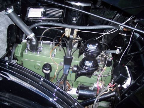 1972 Ford Ranchero - Close-up view of a vehicle's engine bay, showing the engine block and associated components.